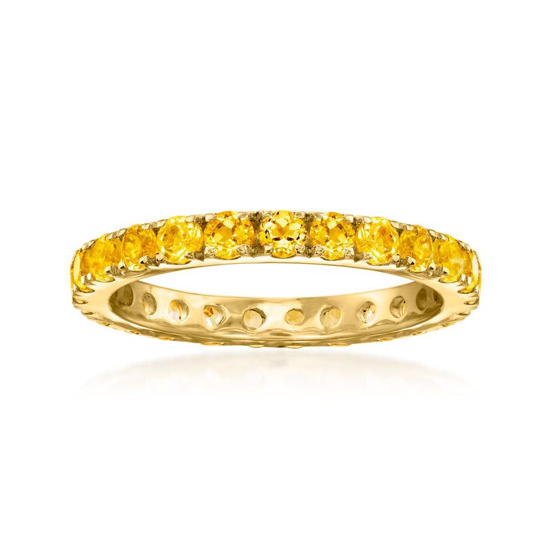 Gold eternity band with round citrine gemstones across the top, polished scalloped edges