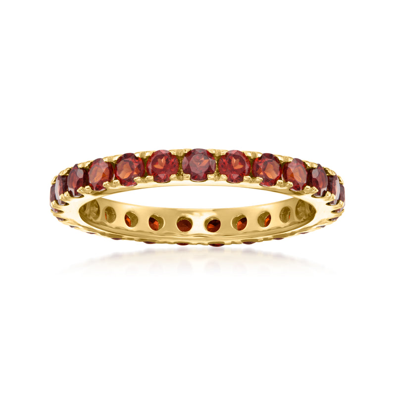 18kt gold over sterling eternity band with red round garnet stones
