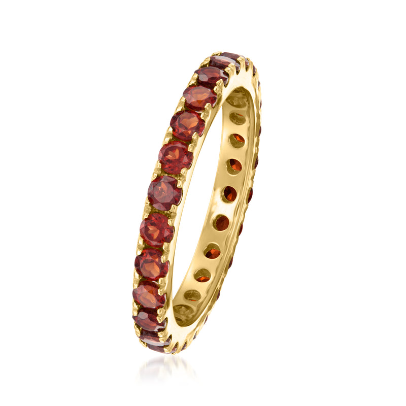 Gold over sterling eternity ring with red round garnet stones in prong settings