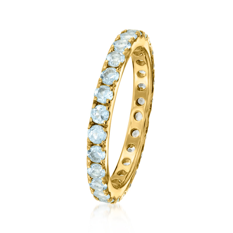 Gold over sterling aquamarine eternity ring with round blue stones, side view