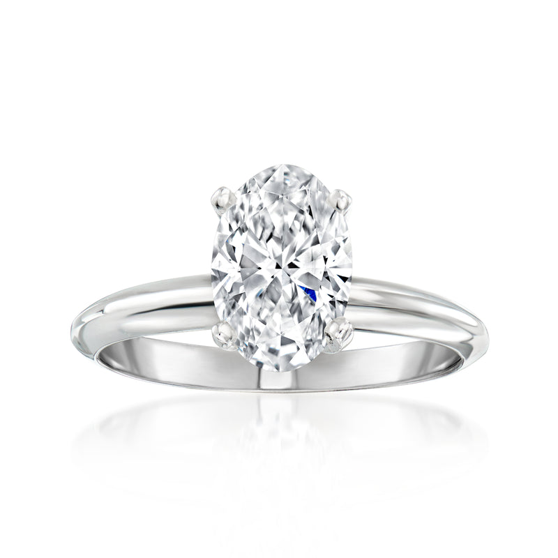 14kt white gold solitaire ring with round diamond center, four prongs