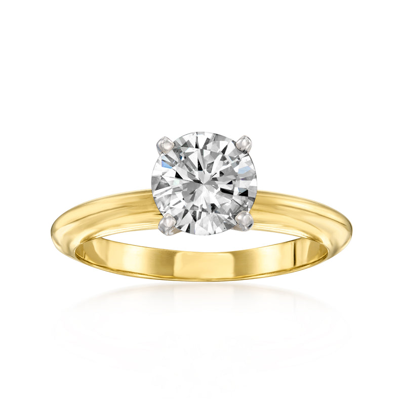 14kt yellow gold solitaire diamond ring with round center stone and four prongs