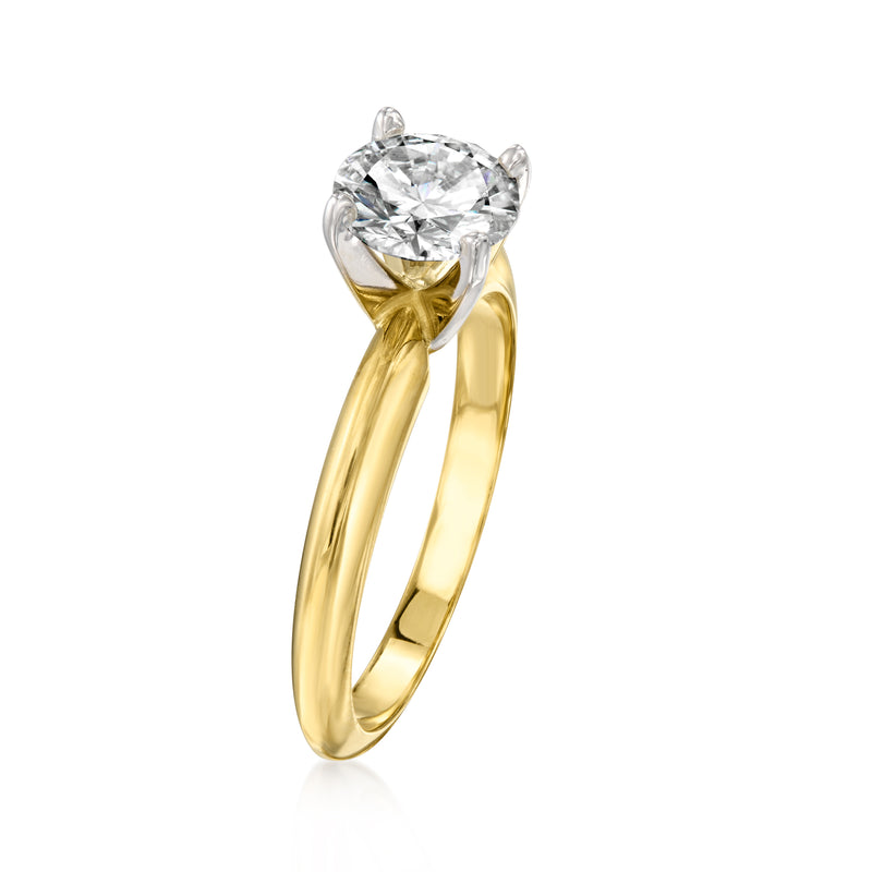 Side view of 14kt yellow gold solitaire diamond ring with round diamond and four prongs