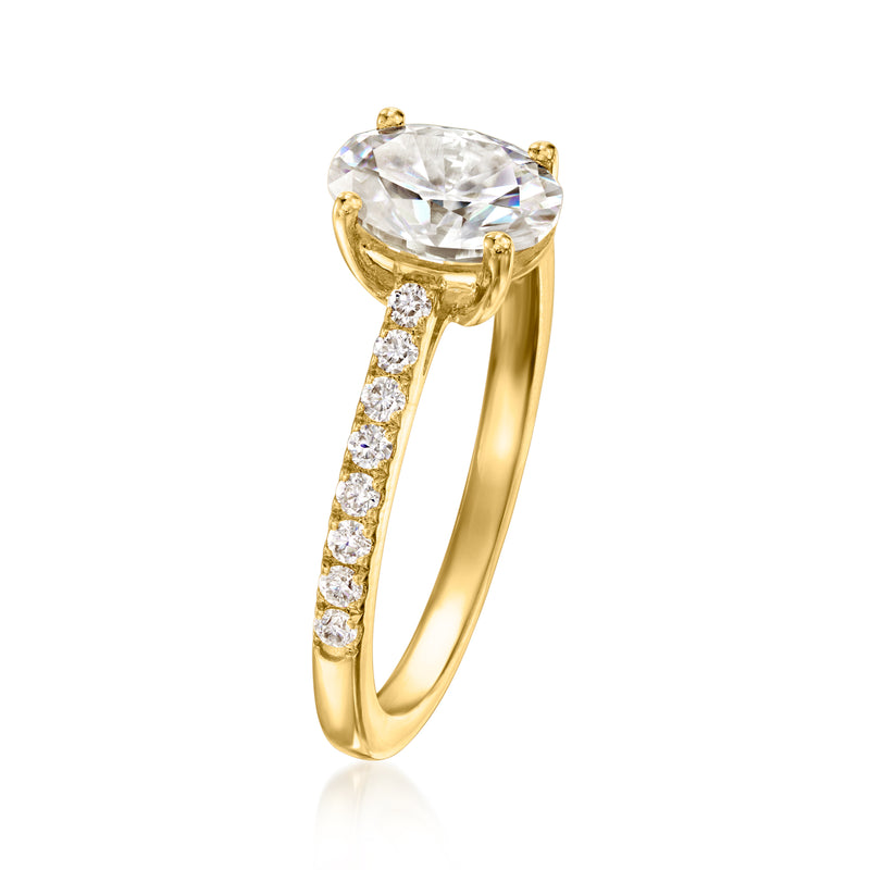 Gold moissanite ring with oval clear center stone and pavé side stones