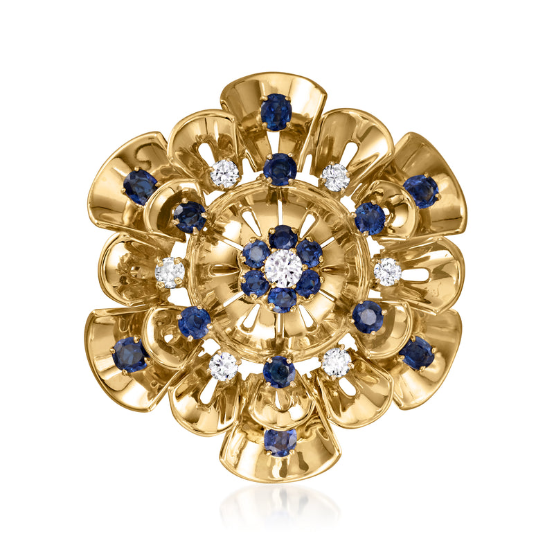 Vintage flower pin in 14kt yellow gold with blue sapphires and white diamonds
