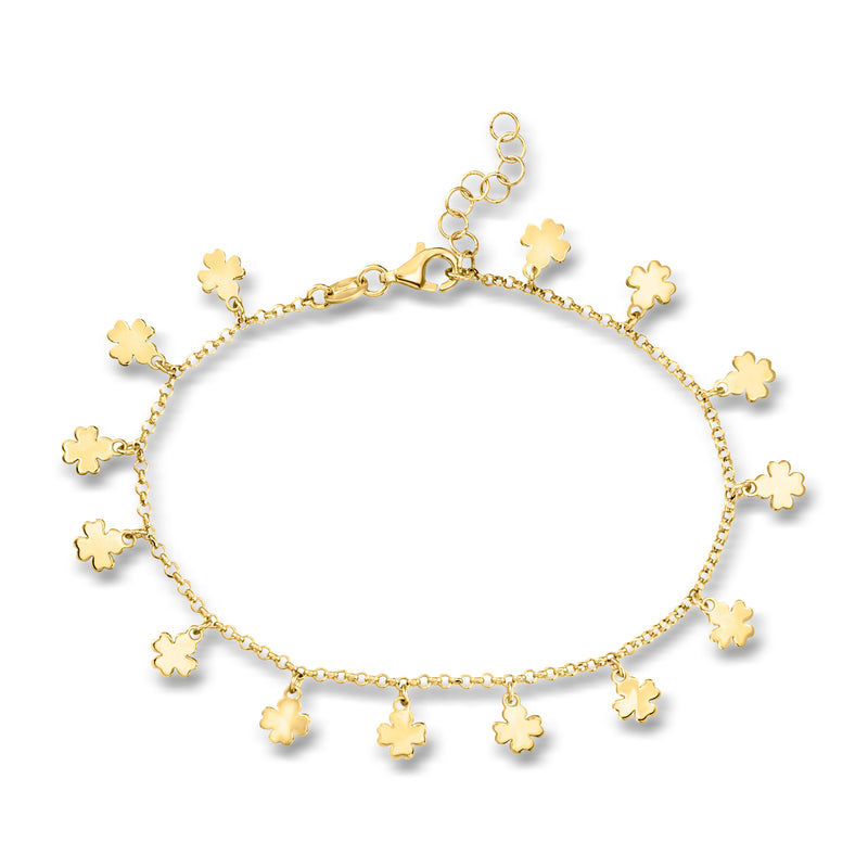 Gold clover charm station bracelet with linked chain and small five-leaf motifs