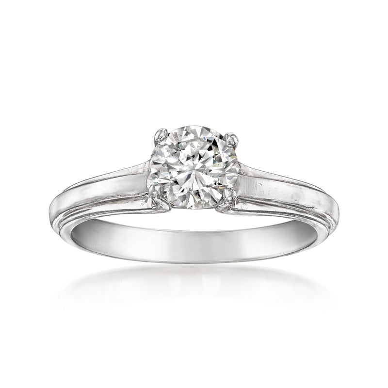14kt white gold solitaire diamond ring with round center stone and split shank