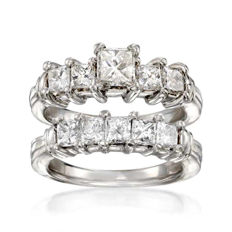 Platinum diamond bridal ring set with one emerald-cut center and five side stones