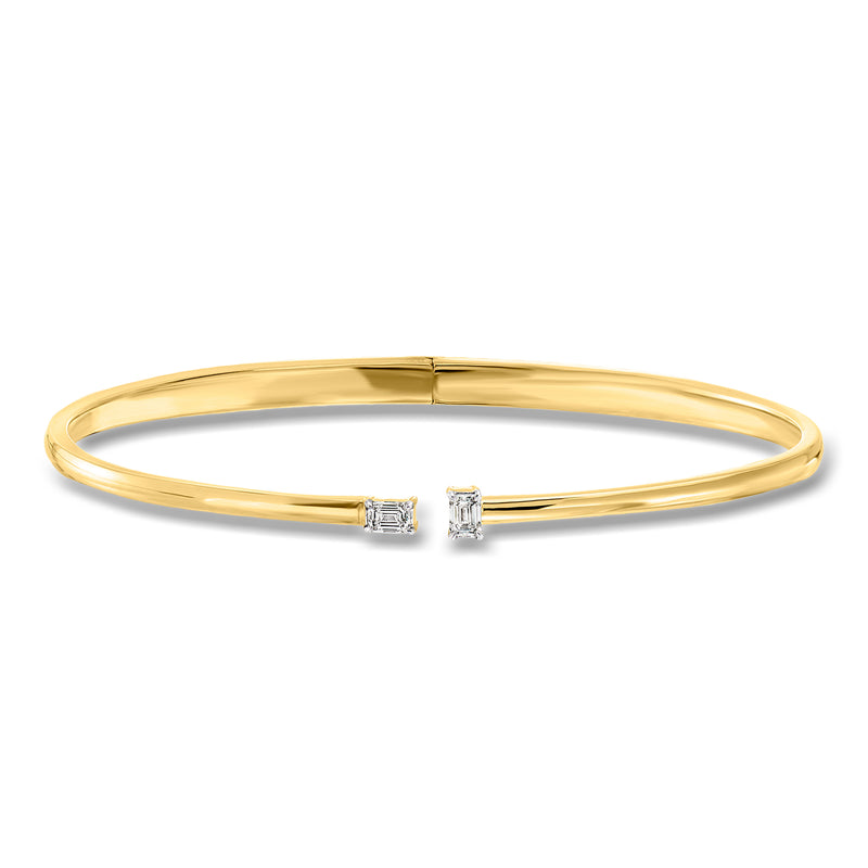 Gold cuff bracelet with central diamond and hinged clasp on 18kt gold over sterling