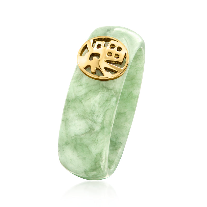 Jade green oval signet ring with raised gold round fortune emblem