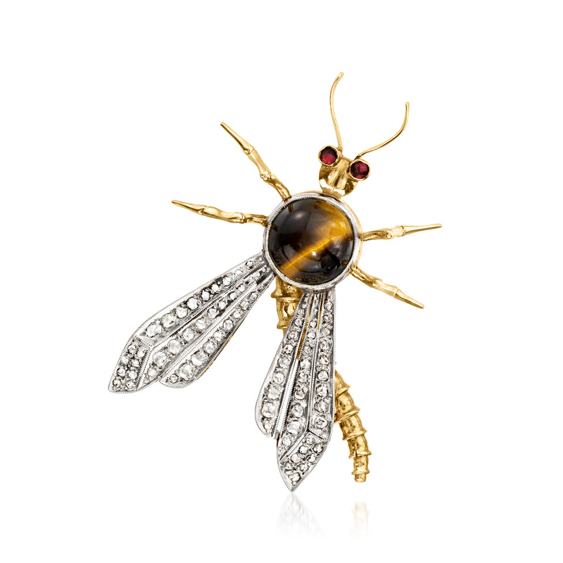 Gold and platinum dragonfly pin with dark tiger eye center, diamond wings, red accents