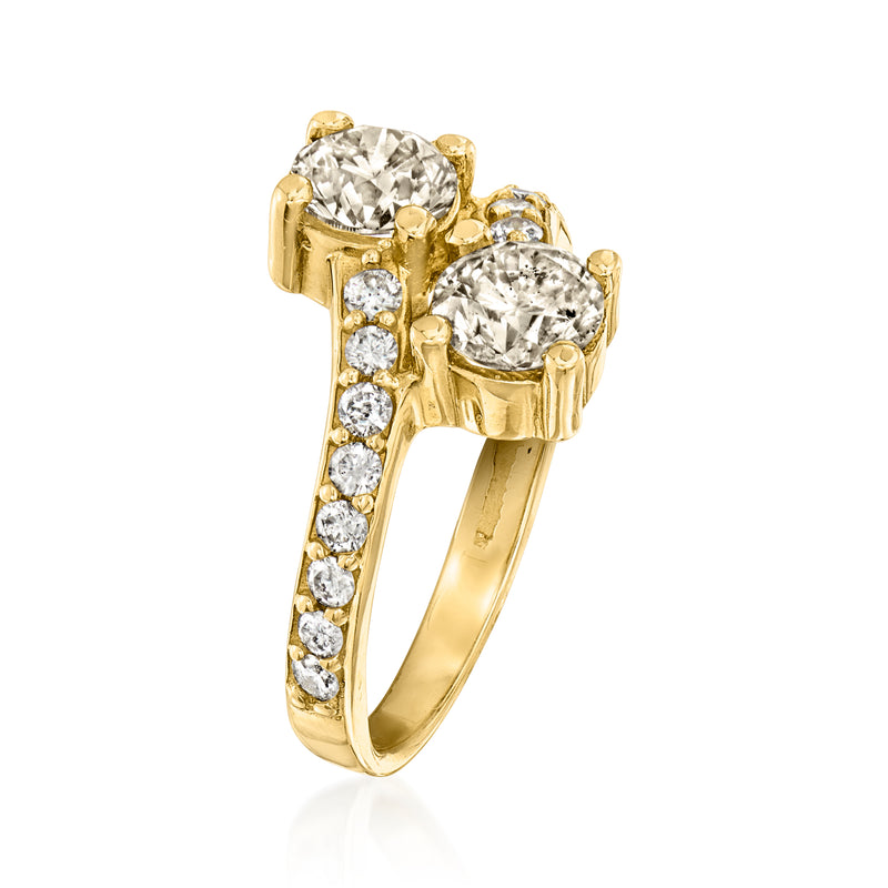 Vintage 14kt yellow gold diamond bypass ring with two oval stones, size 6.5
