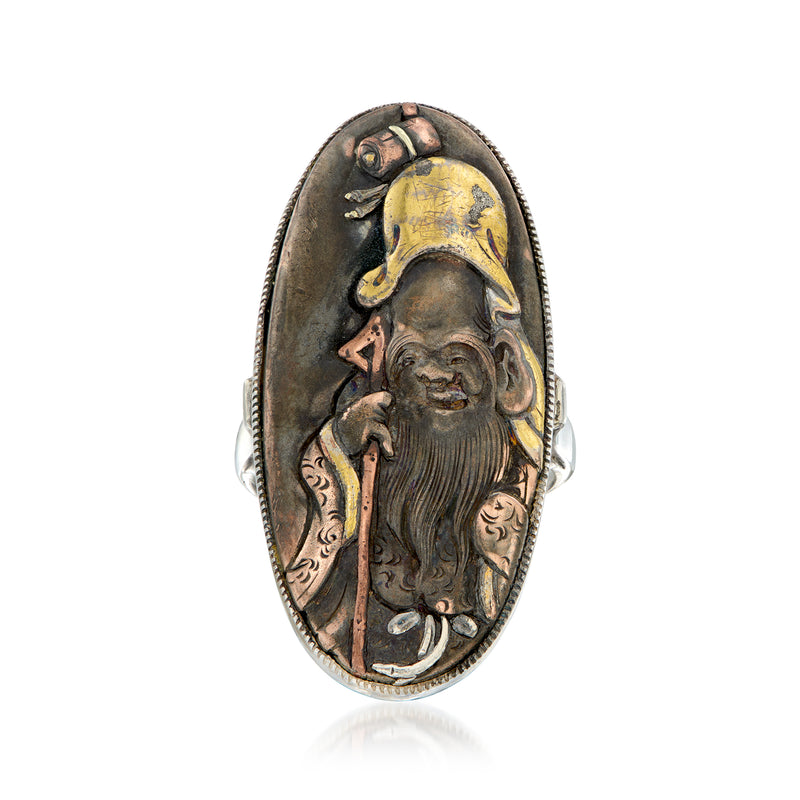 Vintage shakudo oval ring with carved priest figure, copper inlay, sterling band