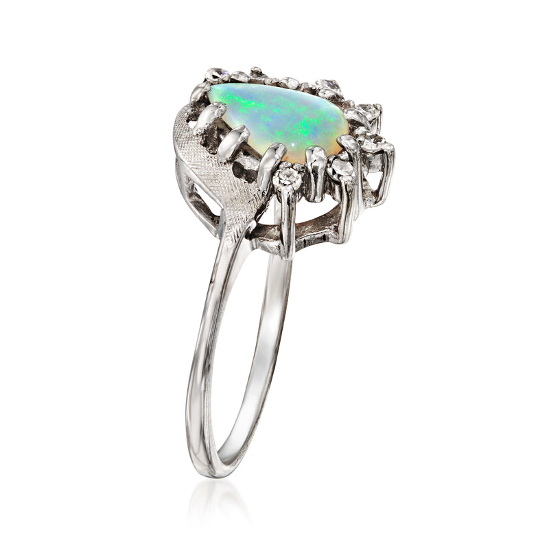 Teardrop opal ring with row of diamonds, white gold prong setting