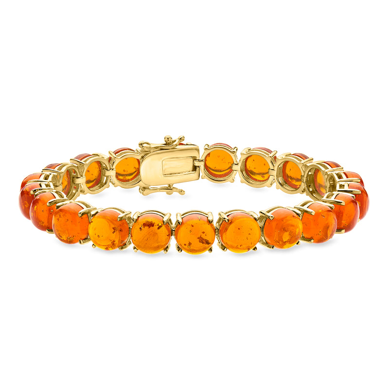 Amber tennis bracelet with oval orange stones and gold clasp
