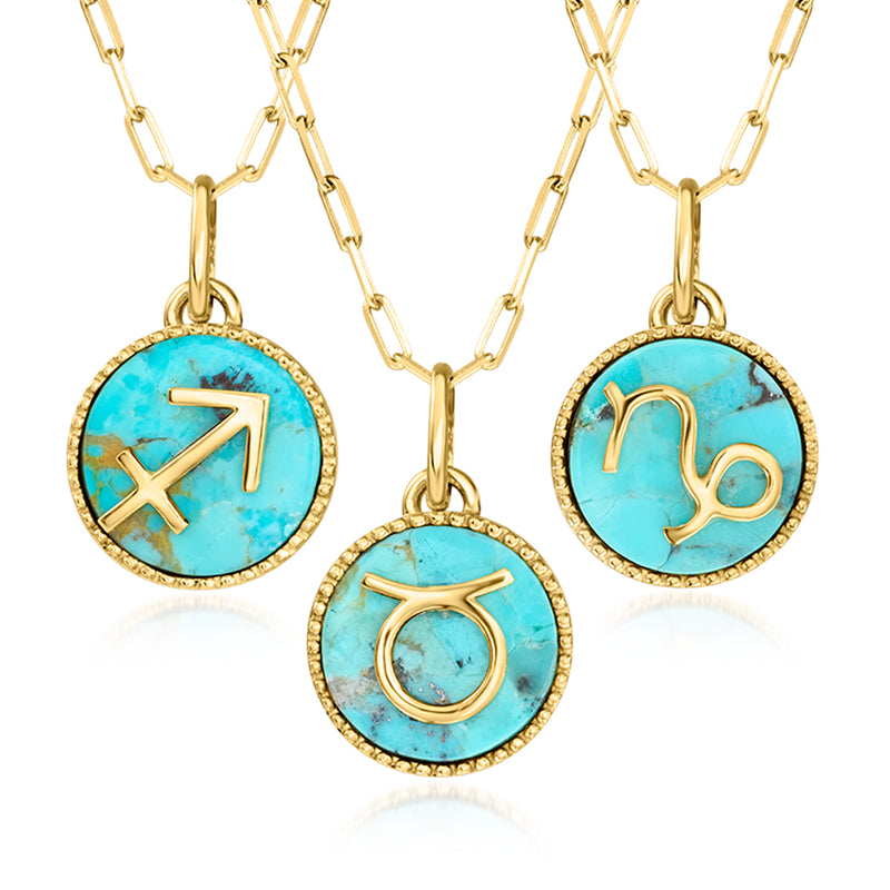 Turquoise round zodiac pendant necklace with three gold-tone charms on a chain