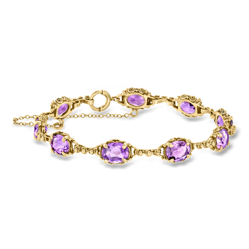 Gold link bracelet with oval purple amethyst gemstones and hinged clasp