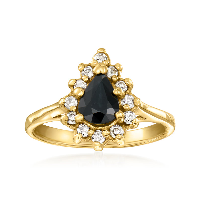 14kt yellow gold ring with dark oval center stone and diamond halo, scalloped prongs