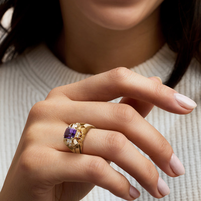 14kt yellow gold amethyst and diamond ring worn on finger