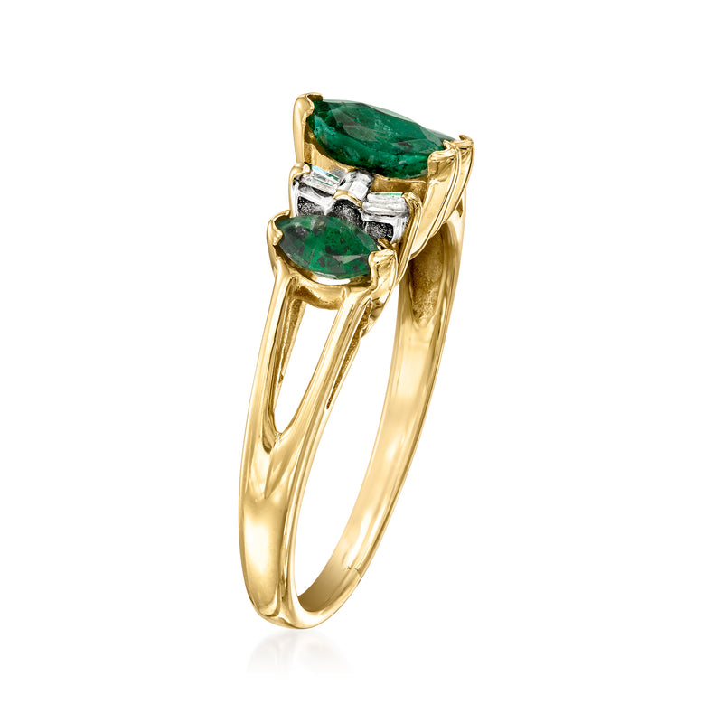 14kt yellow gold ring with emerald-cut green center stone and side diamond accents
