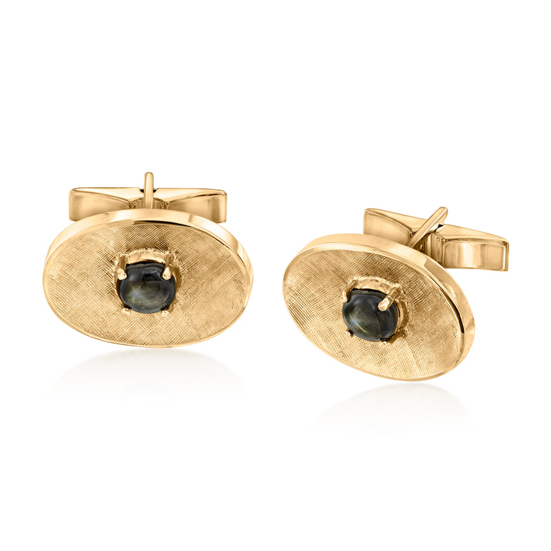 14kt yellow gold oval cuff links with dark sapphire center and textured setting