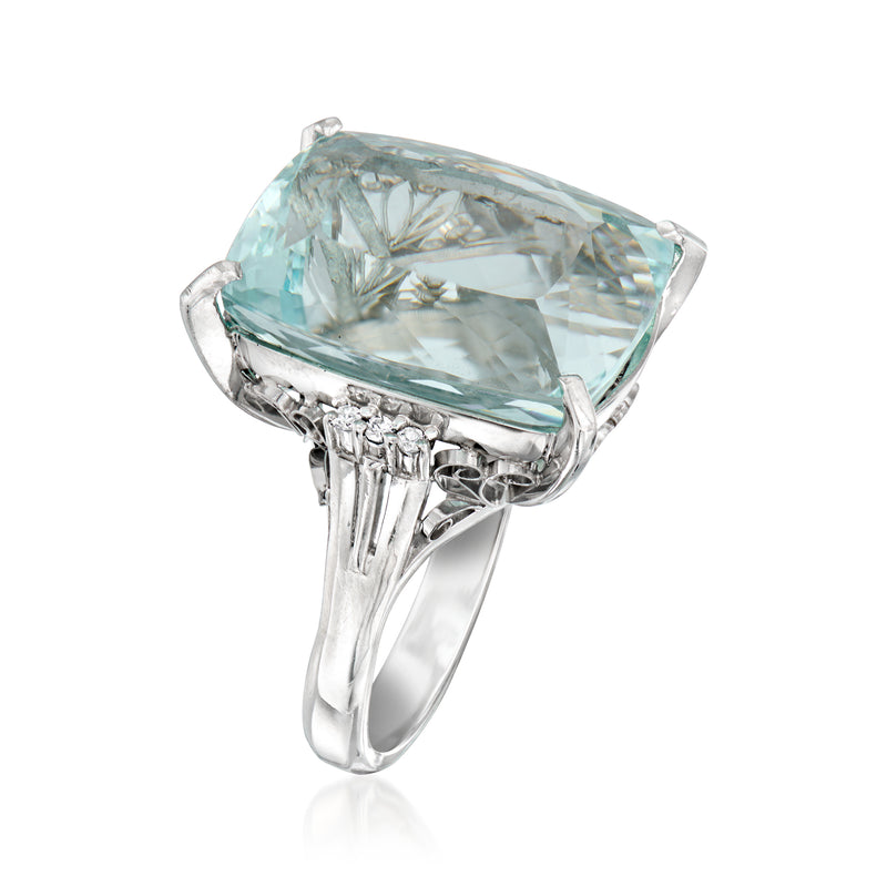 Platinum cocktail ring with large aquamarine and diamond accents