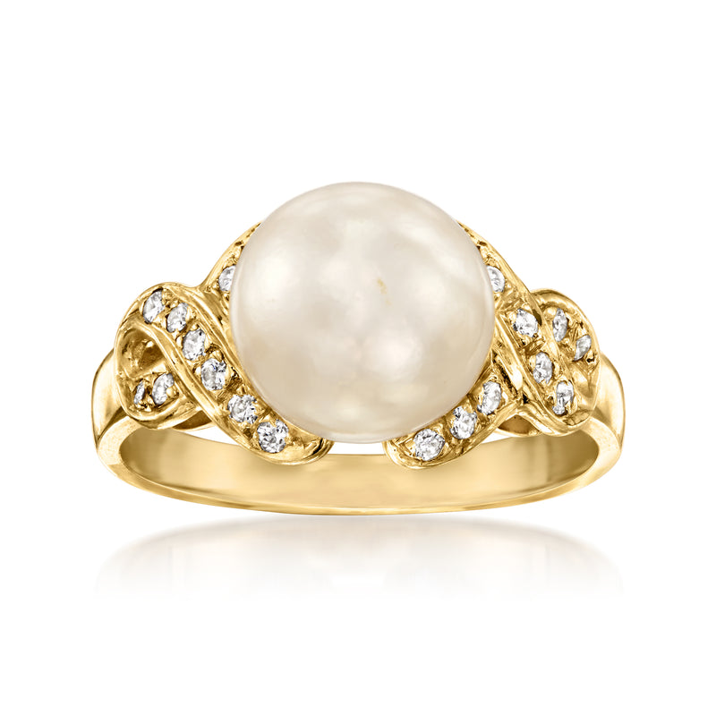 14kt yellow gold ring with large cultured pearl and diamond-set side accents.
