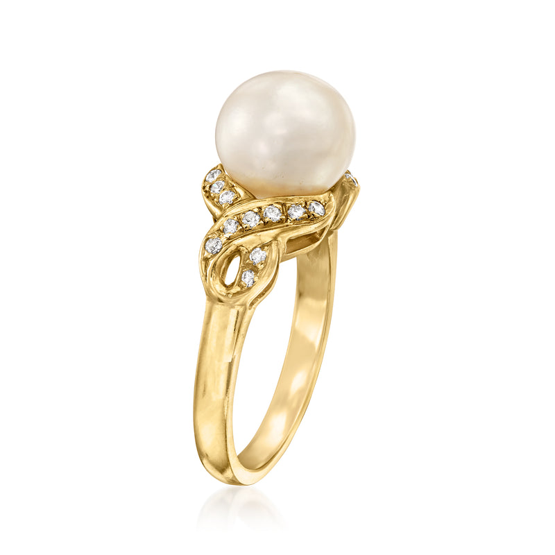 14kt yellow gold ring with round cultured pearl and crisscross diamond band.