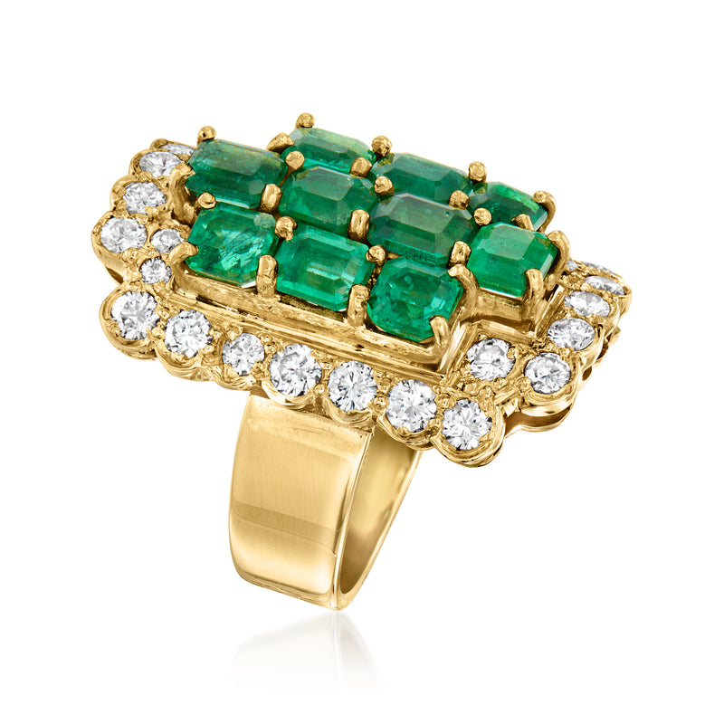 Emerald and diamond cluster ring in 18kt yellow gold, angled side view