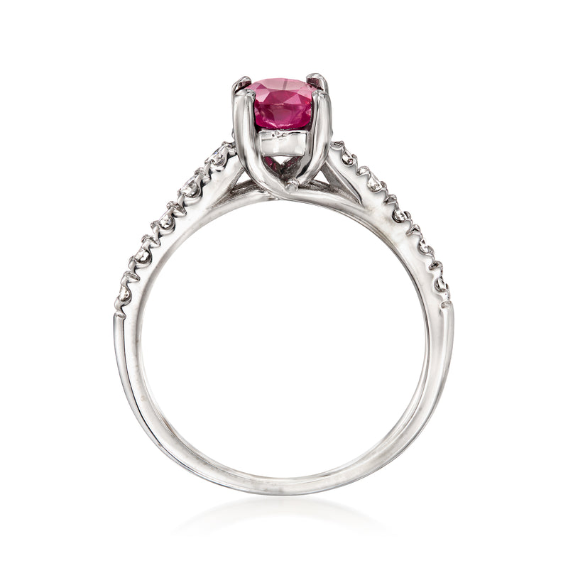 18kt white gold ring with prong-set pink ruby top and diamond channel-set shoulders
