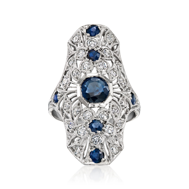 Platinum vintage flower ring with blue sapphires and diamond accents, size 7