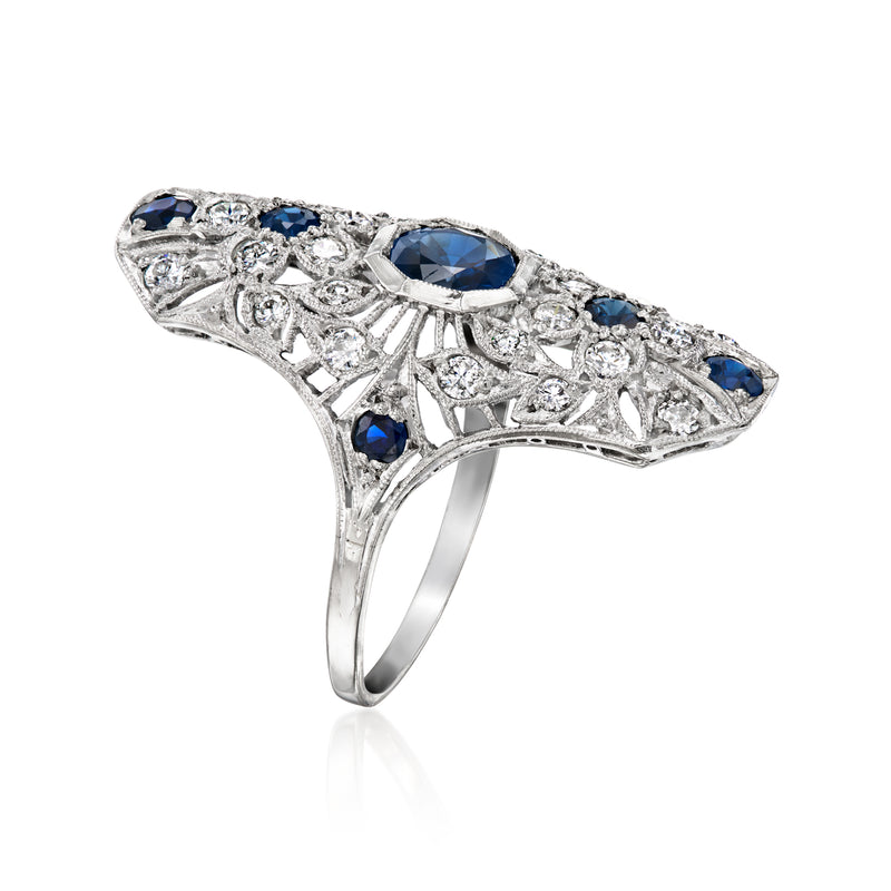 Platinum vintage sapphire and diamond ring with blue center stone, side view