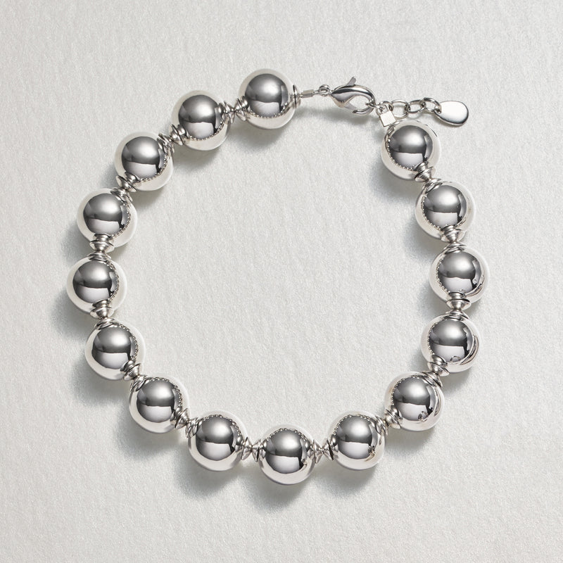 Silver-plated ball bead bracelet with round beads and lobster clasp