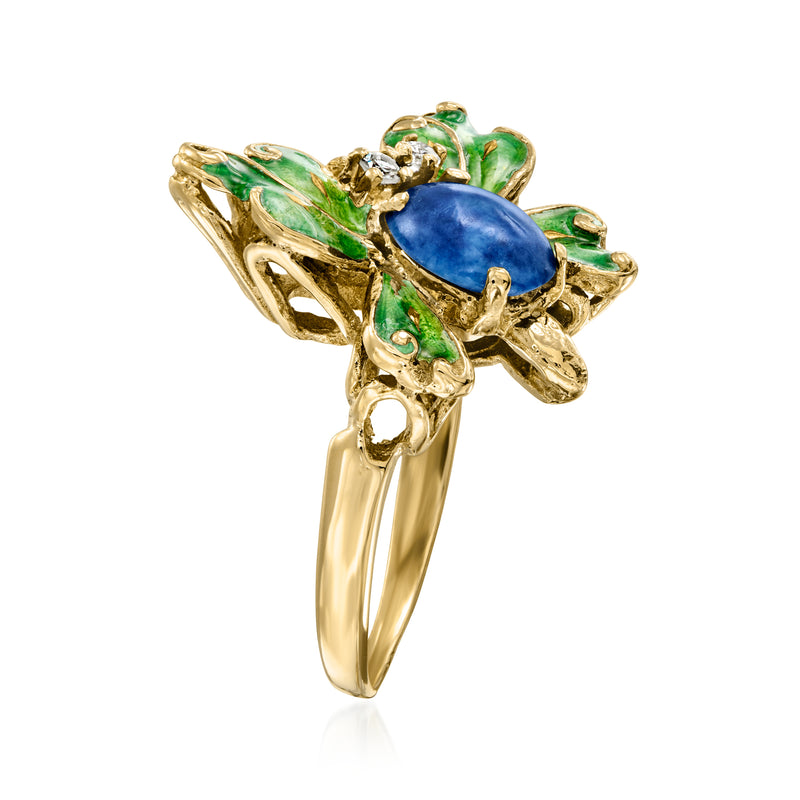 Butterfly ring side view with blue center stone, green enamel wings, diamond details