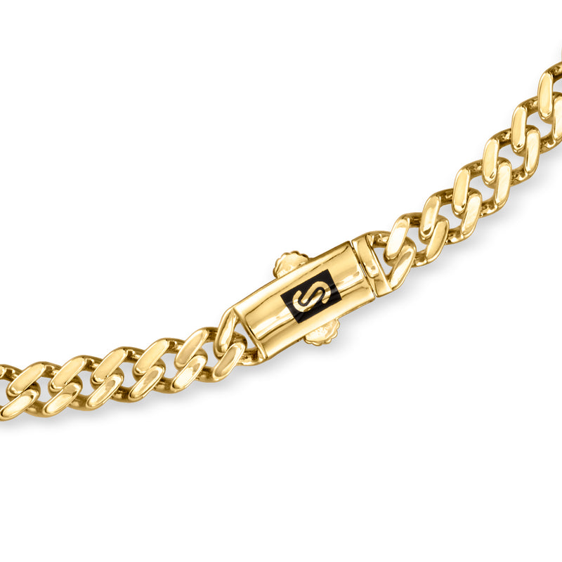 Yellow gold curb-link necklace clasp with engraved emblem detail