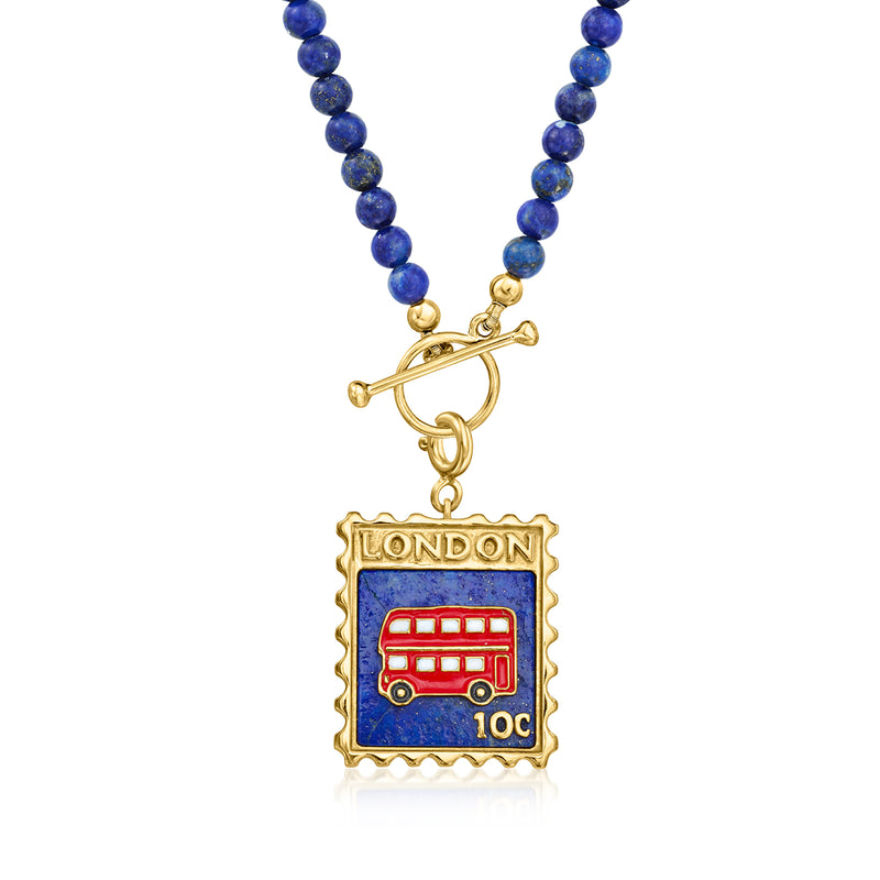 London stamp-style charm with red bus on blue enamel, shown on blue bead necklace chain