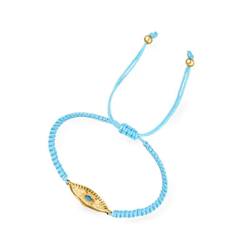 Adjustable light-blue cord bracelet with gold evil-eye charm and blue bead detail