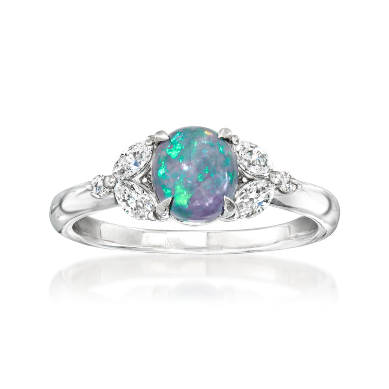 Platinum opal and diamond oval cluster ring with teal-blue iridescent center