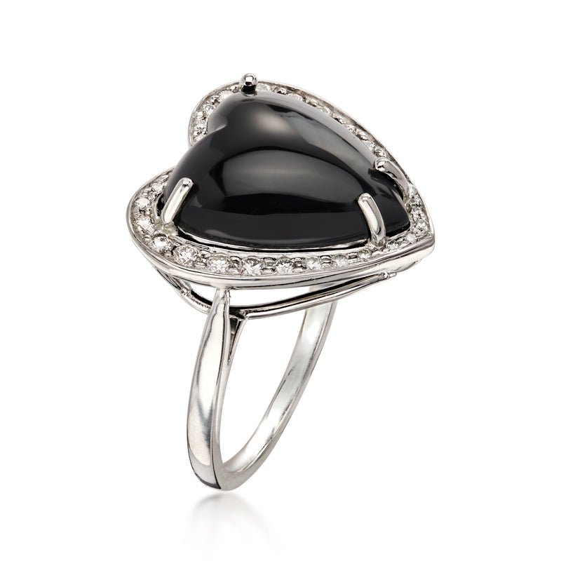 Vintage platinum heart ring with onyx center and diamond border