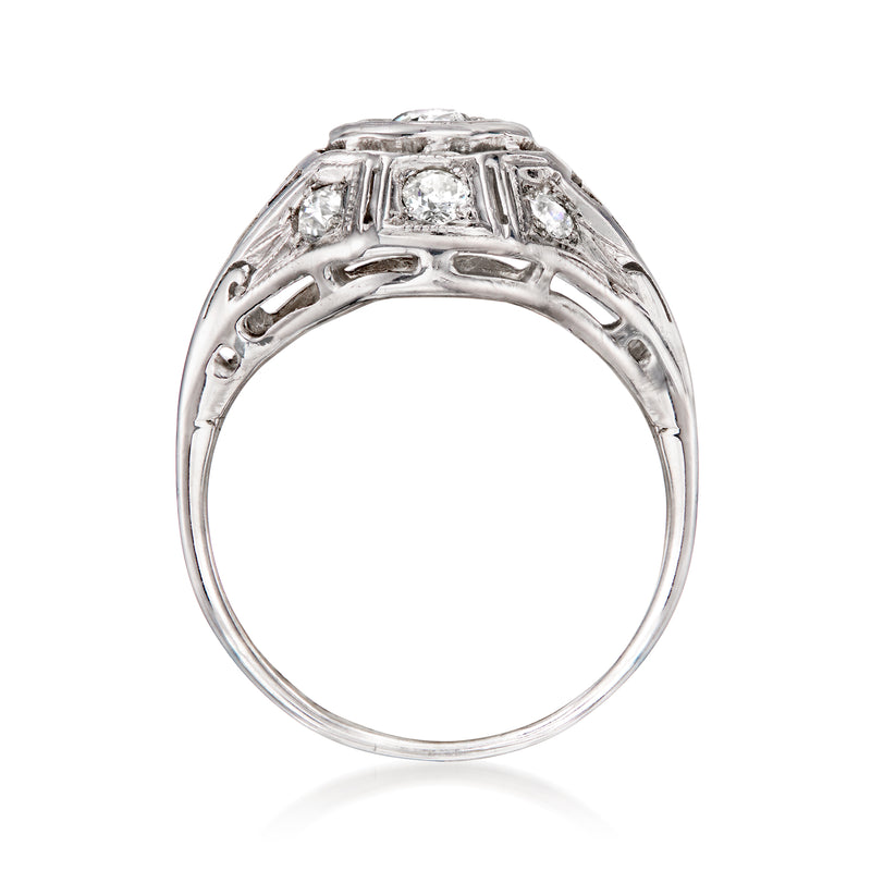 Vintage 18kt white gold diamond ring, top view showing raised bezel and band prongs