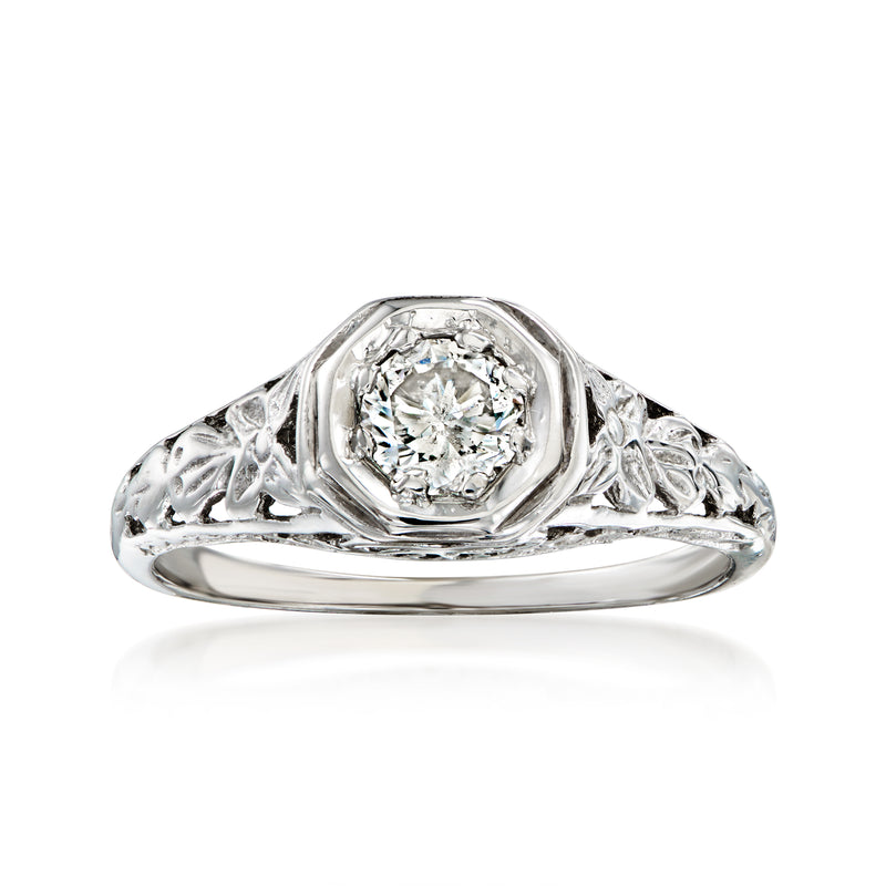 Vintage diamond filigree ring in white gold, round center stone and scalloped band