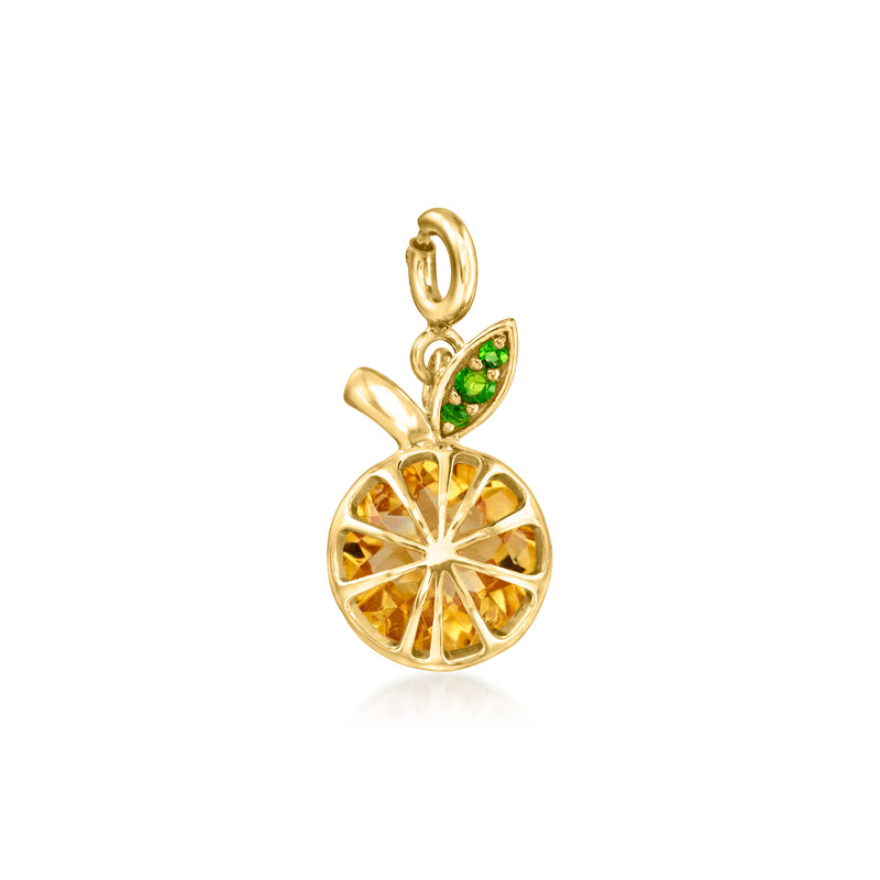 Gold-tone citrus slice charm with green accents and top loop bail