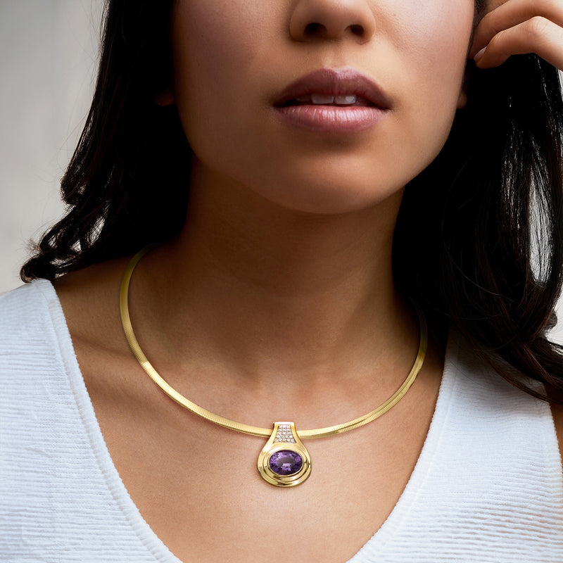 Amethyst diamond slide pendant on 14kt yellow gold chain, worn on model's neck