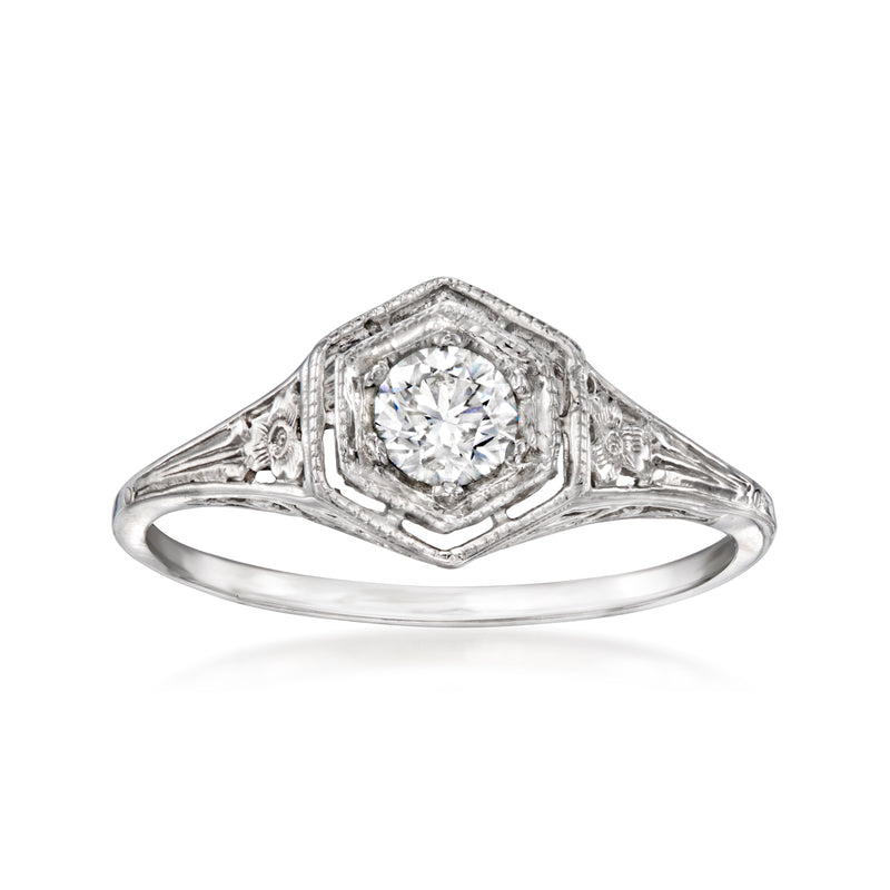 Vintage diamond filigree ring in 14kt white gold with round center stone