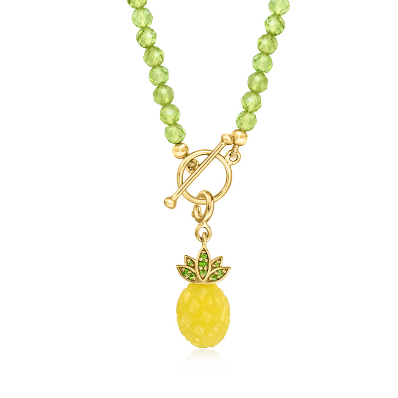 Gold pineapple charm with green beaded strand and clasp