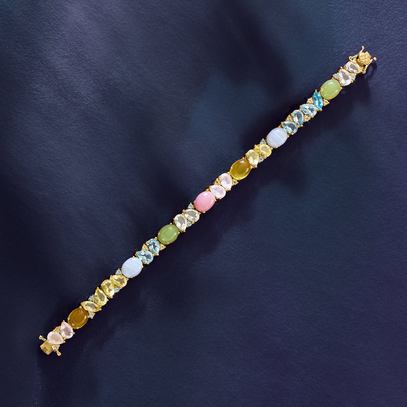 Pastel multi-gemstone bracelet with gold-toned links and oval yellow, green, pink stones