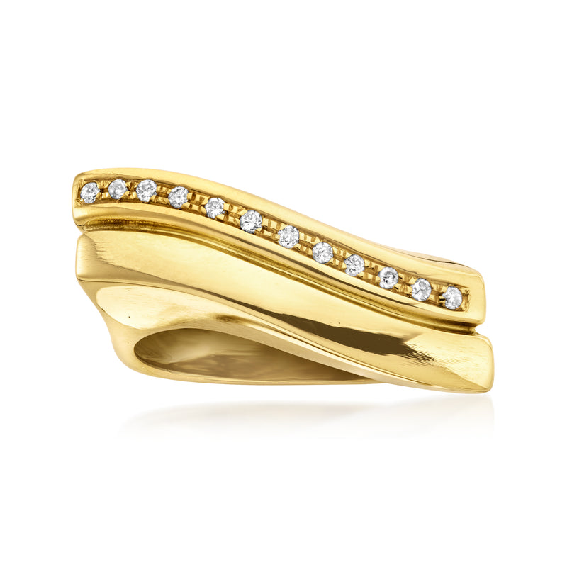 Vintage 18kt yellow gold wave ring with a row of diamonds
