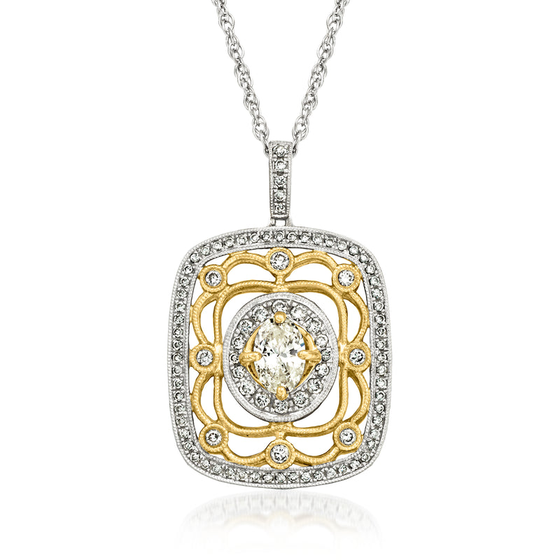 Two-tone gold diamond pendant with round center stone, textured border, link chain