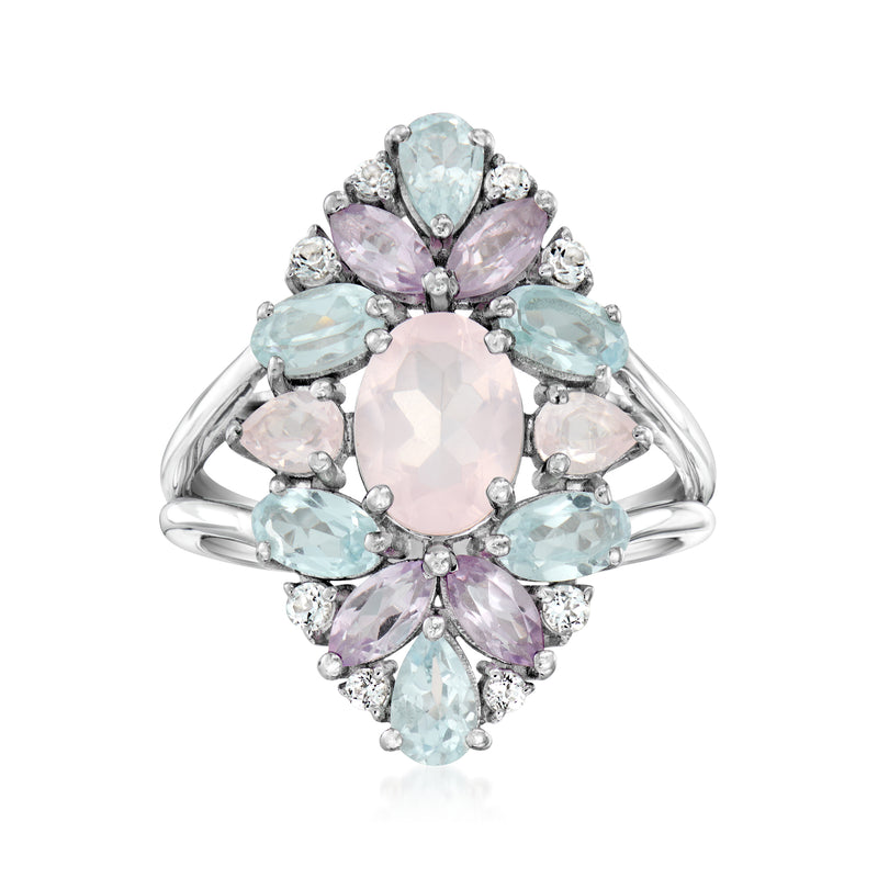 Sterling silver ring with oval pink center and pastel blue/purple gemstone halo