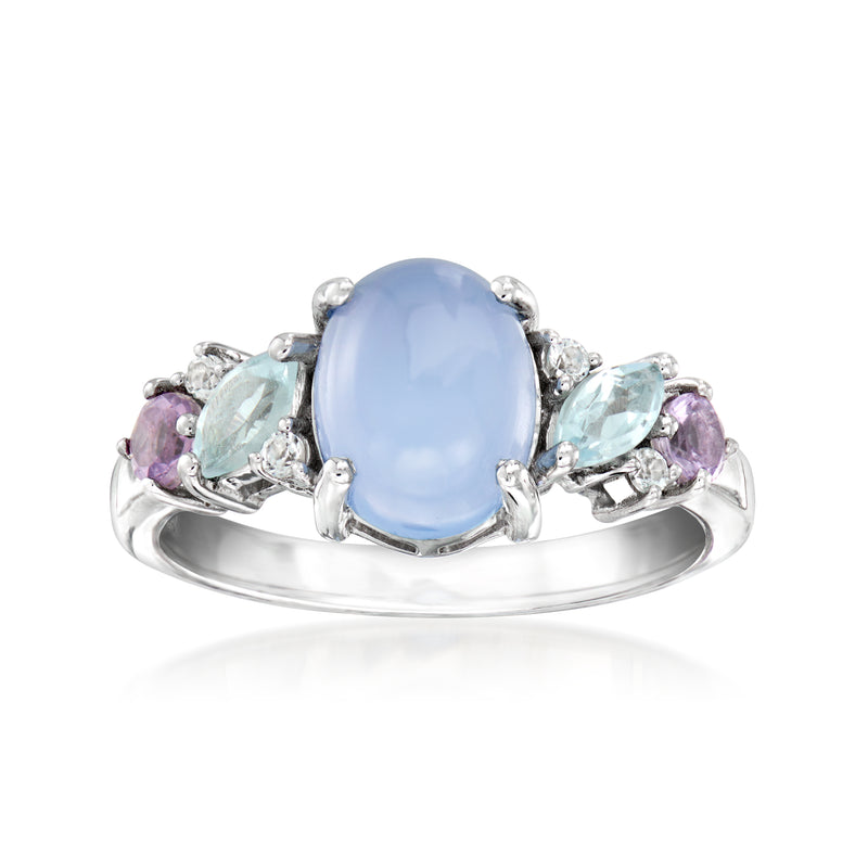 Sterling silver ring with oval blue gemstone and pastel multi-gem side stones